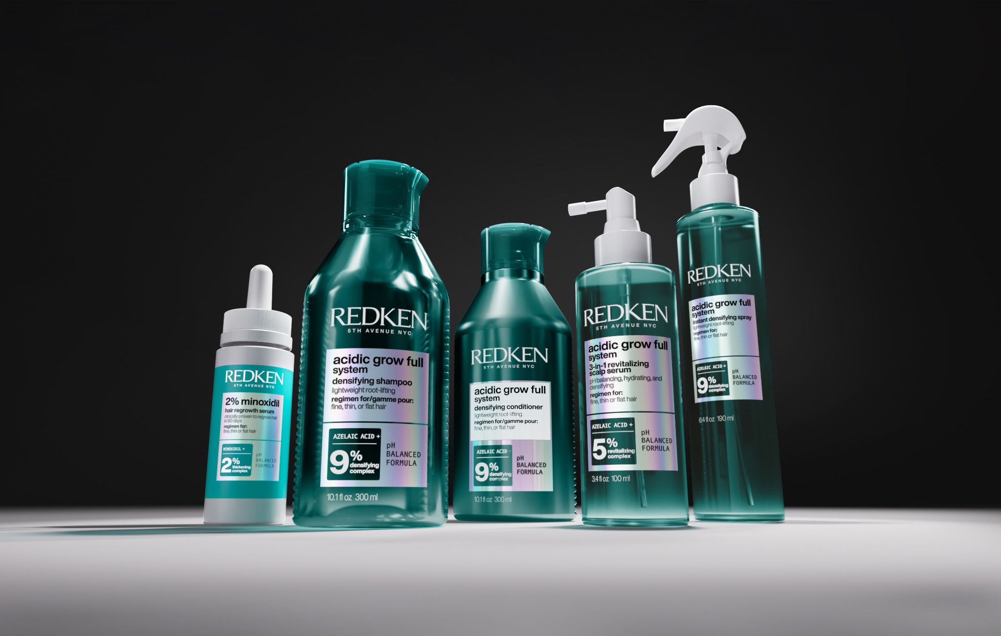 Full regimen in teal and holographic. A redesigned line shown the way it'll appear at backbar.