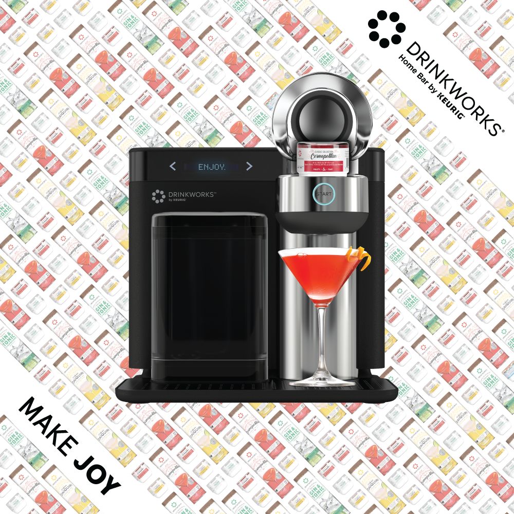 The Drinkworks Home Bar machine itself, staged against a repeating can pattern with a finished cocktail in hand. "Make joy" as the closing line.